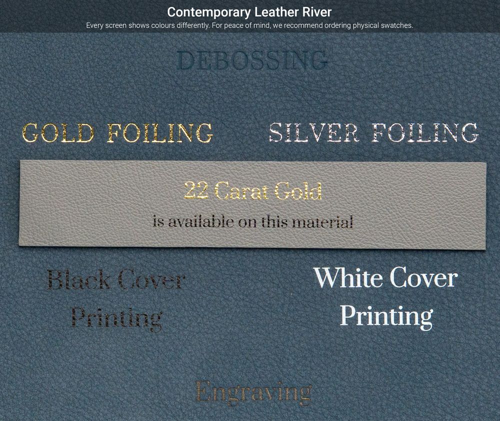 Close-up view of metallic gold and silver foiling text samples on a contemporary leather material surface.