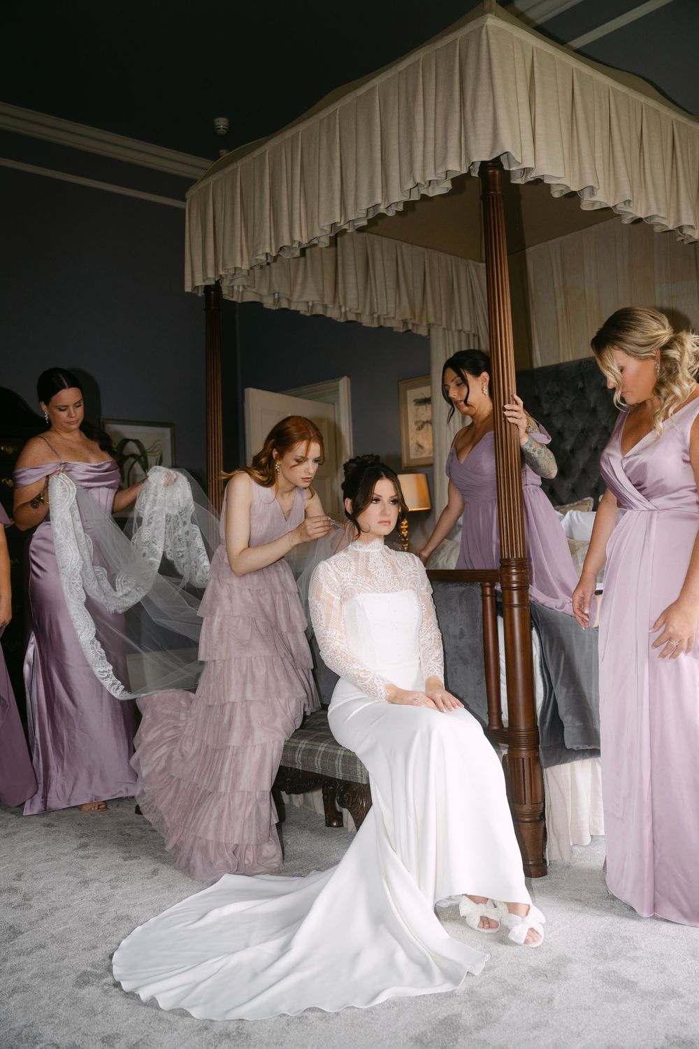 A series of wedding preparation photos showing bridesmaids in lavender dresses helping with a white wedding gown.
