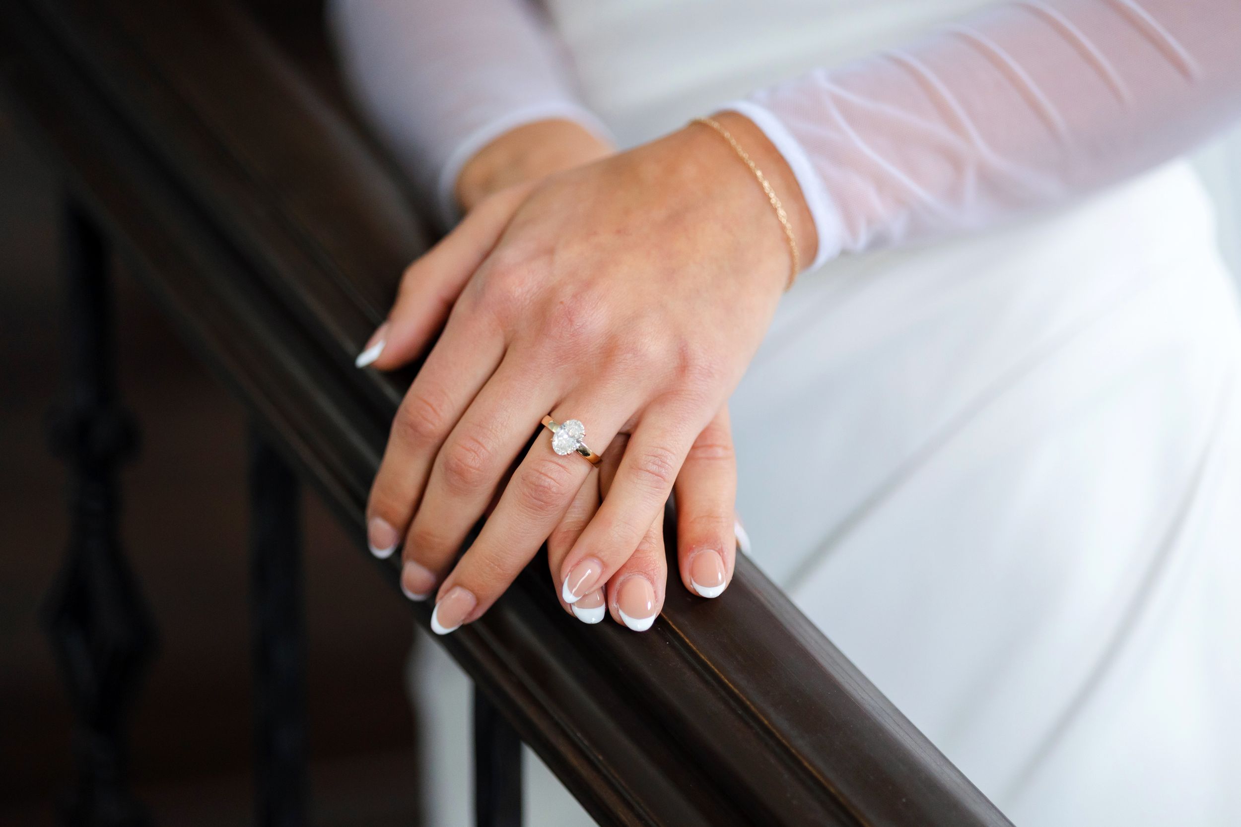 Bride's hand and engagement ring captured by Tom Forrest Photography from Hudson, Ohio.