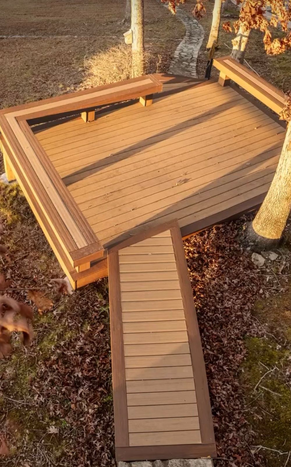 Progression of building a wooden mailbox post with decorative trim and sloped top in an outdoor setting.