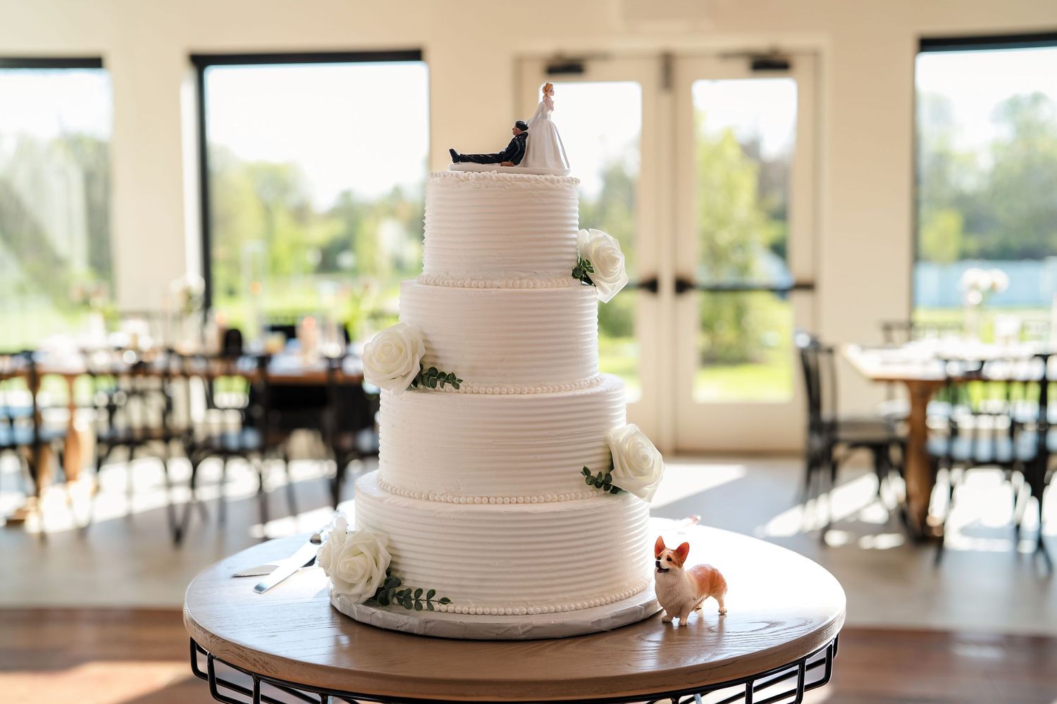 A white wedding cake  in white willow meadows