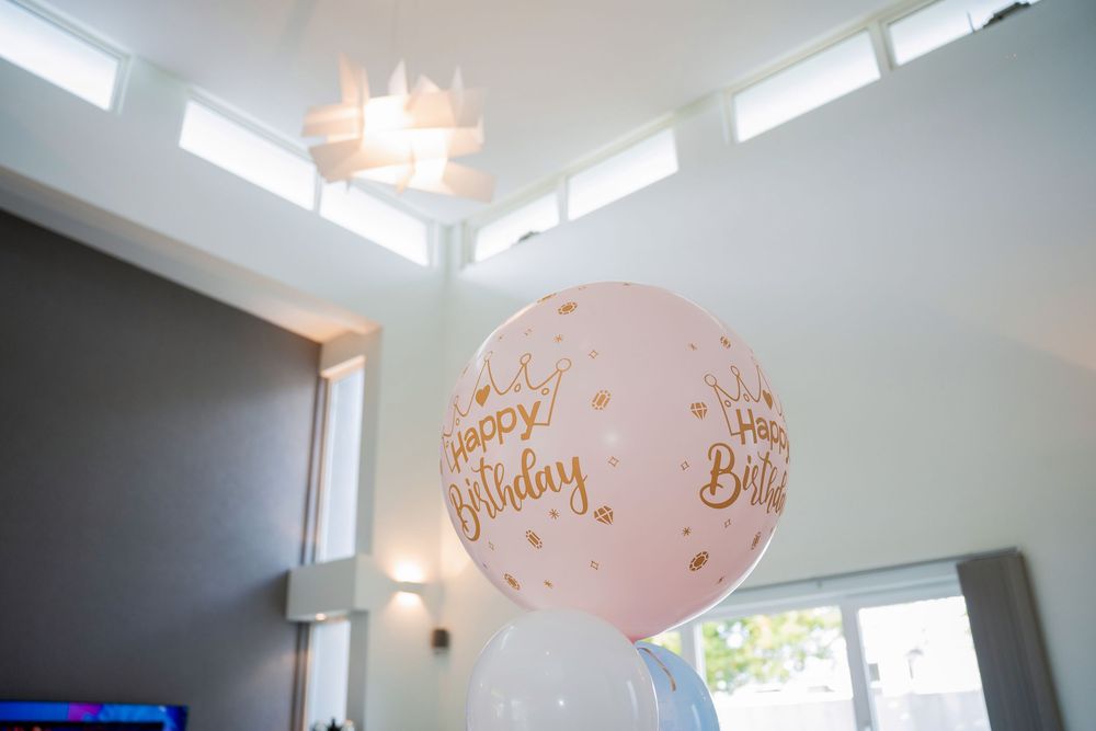 Auckland kids party photography capturing face painting activities and beautiful party food details.