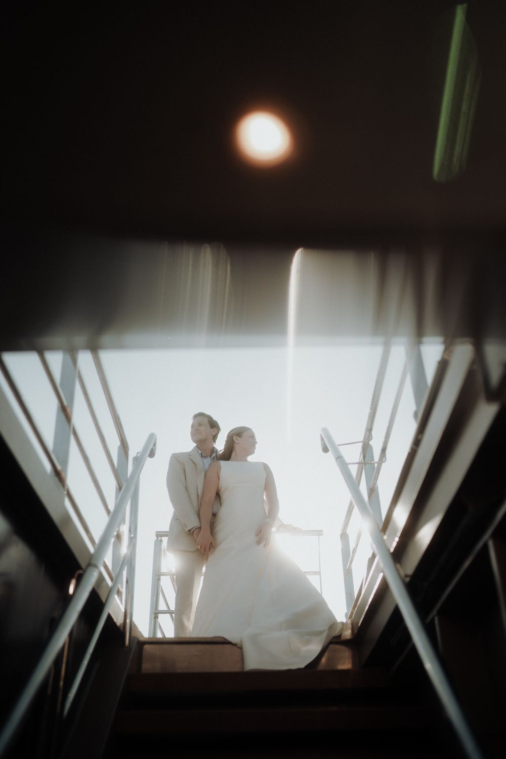 porto elopement photographer documentary intimate wedding couple walking stairs porto portugal