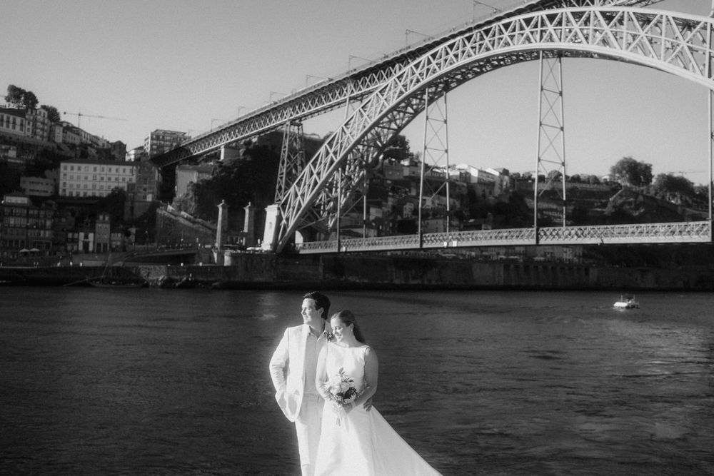 porto elopement photographer documentary intimate wedding couple by douro river porto portugal