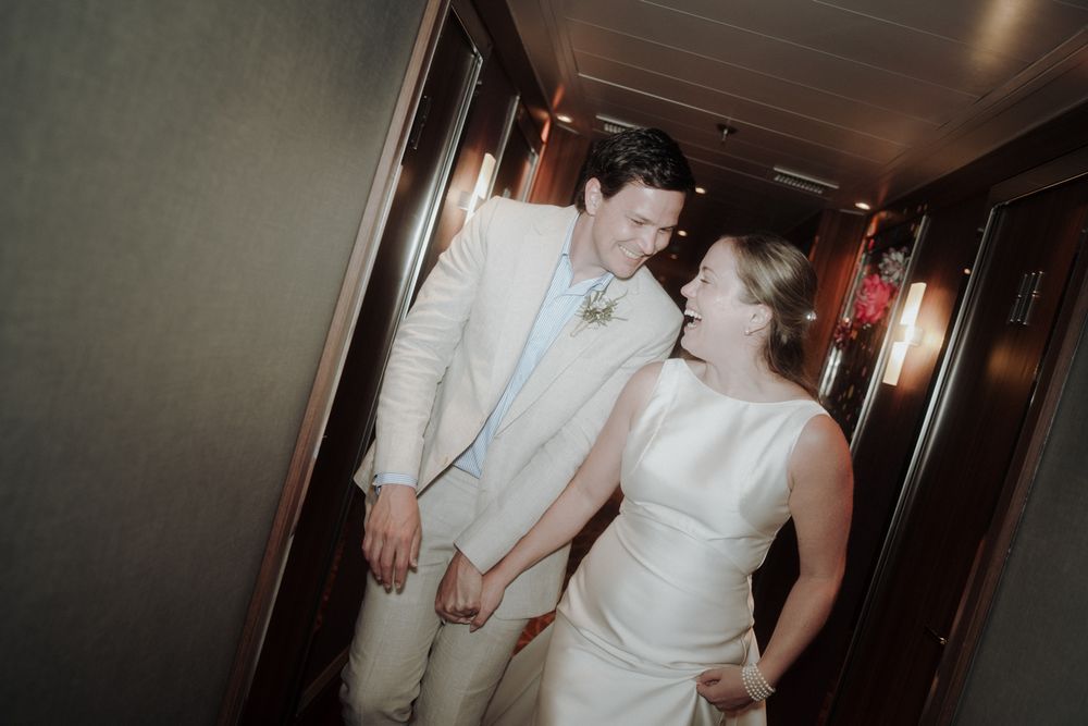 porto elopement photographer documentary intimate wedding couple walking indoors porto portugal