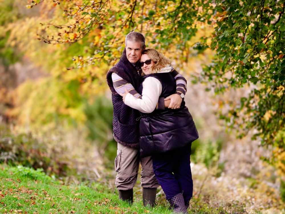 Two people are posing but photo of two look natural. This photo shoot in a beautiful place on the hills in Surrey will remind this couple...