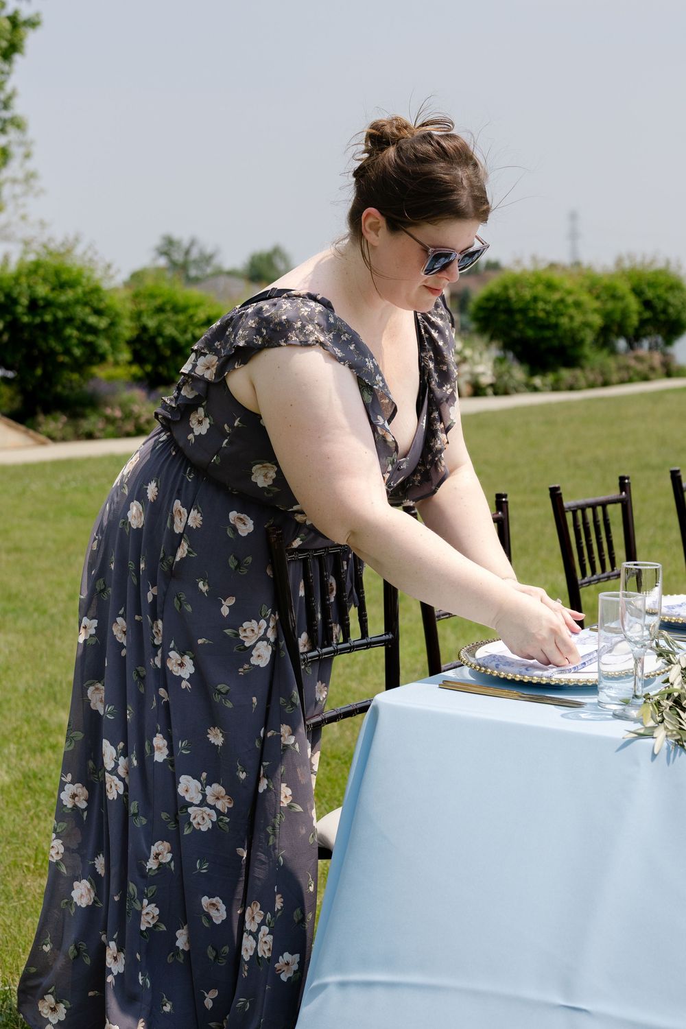 Kat Epneris of Signature Event Planning organizing a wedding day timeline in Central Ohio