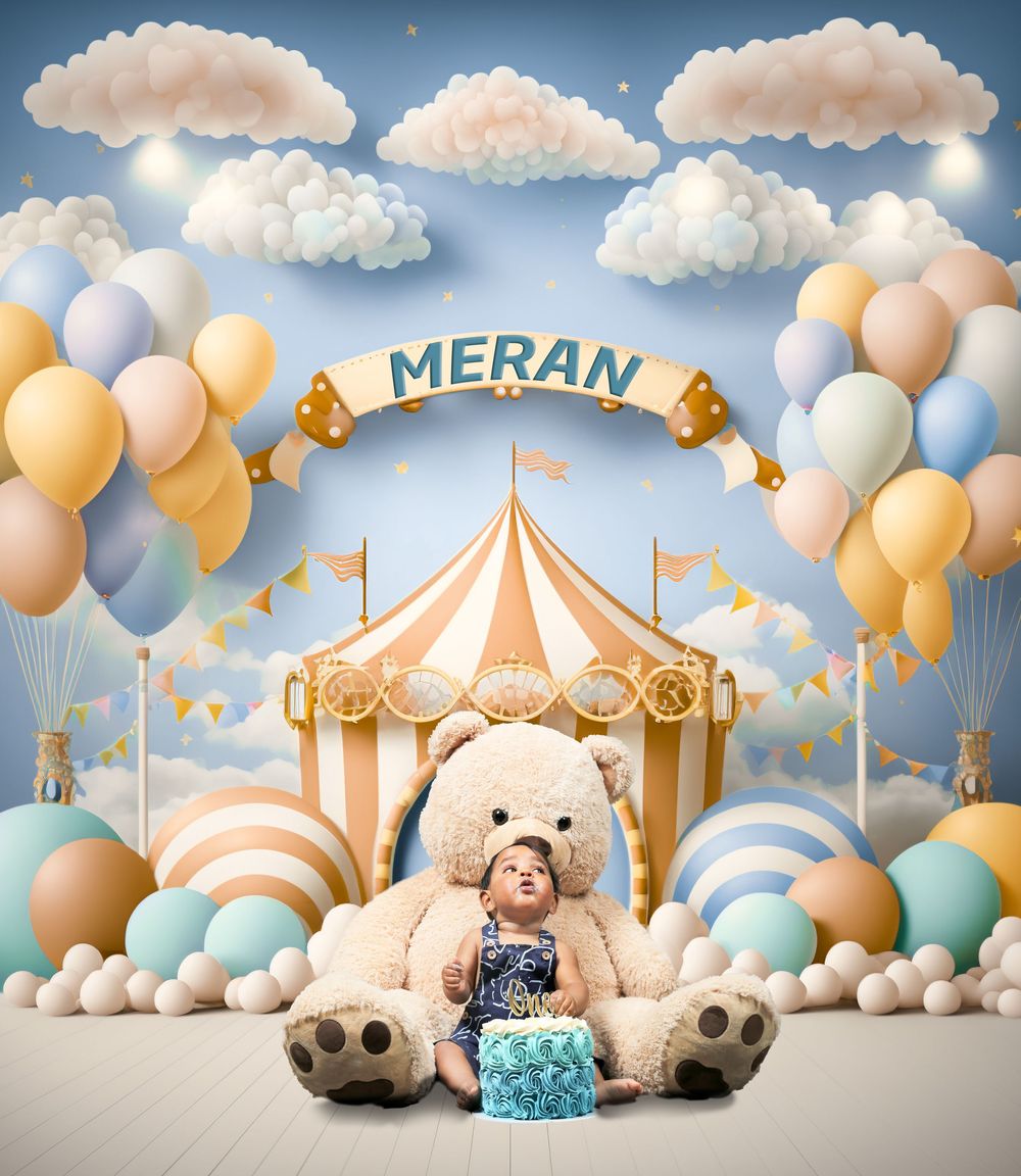 Whimsical carnival setup with a pink circus tent, pastel balloons, fluffy clouds, and teddy bear decorations.