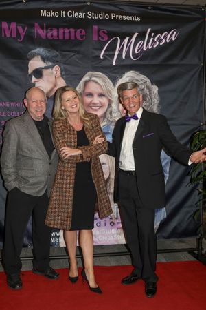 Four people in formal attire pose together on a red carpet at a "My Name Is Melissa" studio event backdrop.