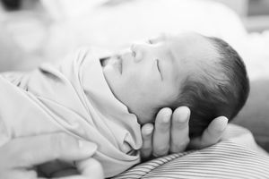 Collage of peaceful sleeping babies in various cozy positions wearing white clothes against light backgrounds.
