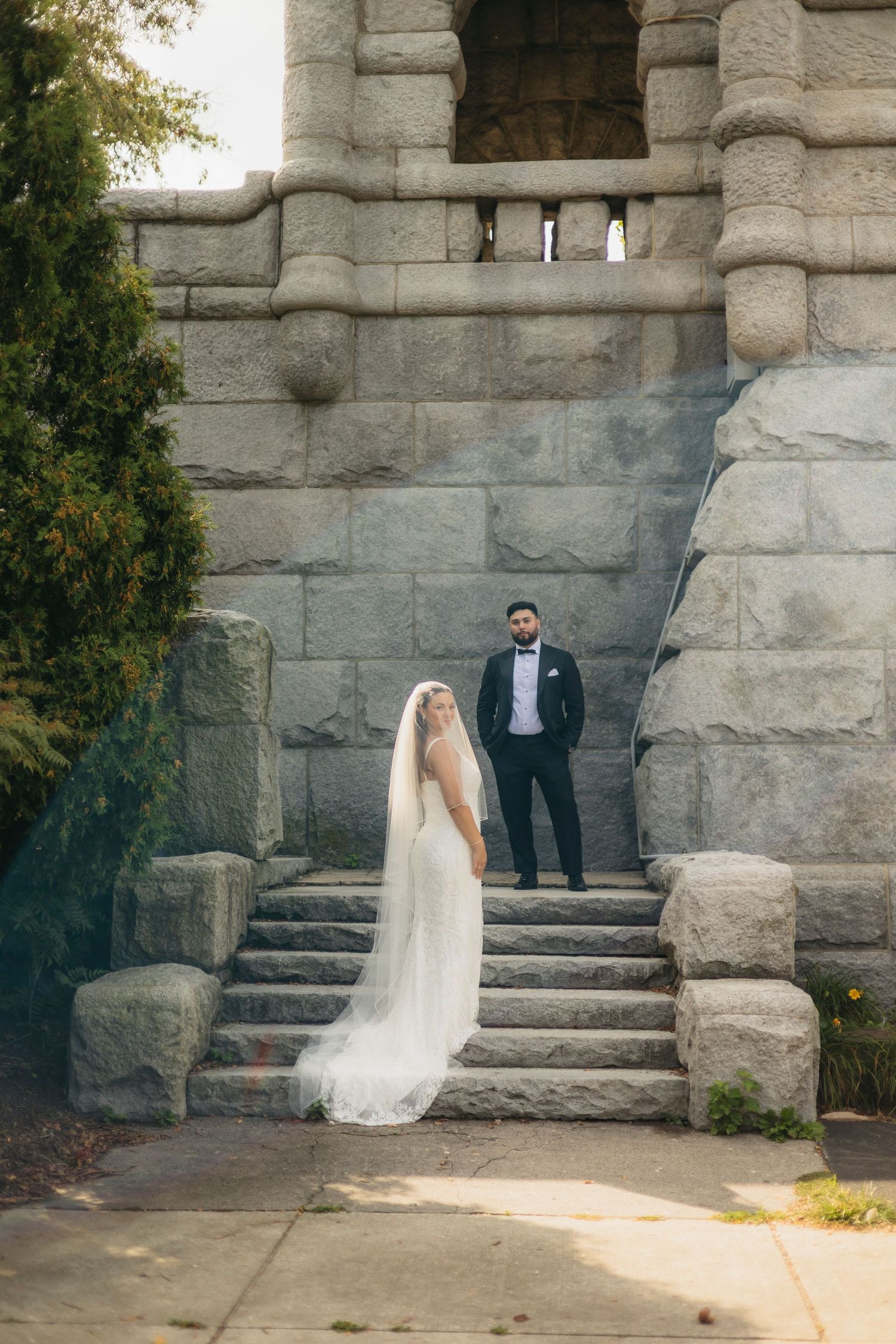 Chicago Wedding couple poses on stone staircase in sequence of artistic frames showing movement and composition.