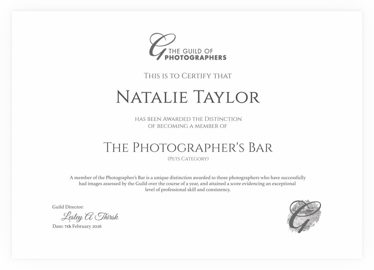 An elegant photography certification document with calligraphy text and decorative borders.