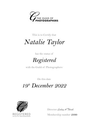 A professional photography certification document from The Guild of Photographers showing registered status from December 2022.