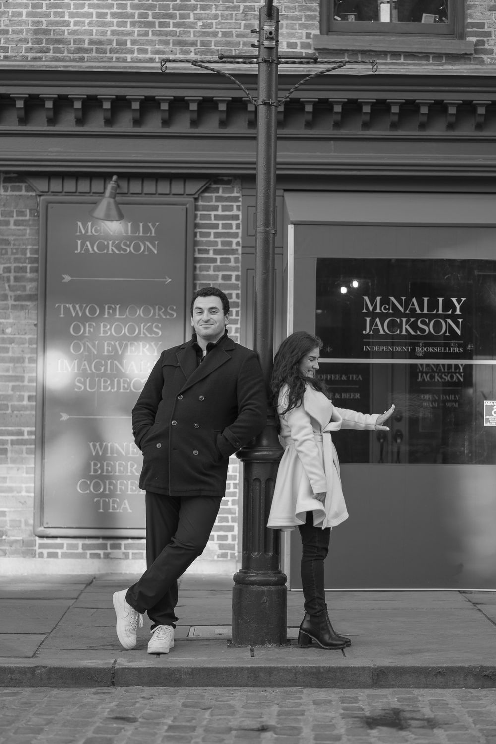 Black and white storefront images showing window displays for Jackson and McNally bookstores with signage visible.