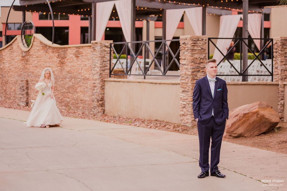 A sequence of wedding ceremony photos showing moments between guests and the wedding party at an indoor venue.