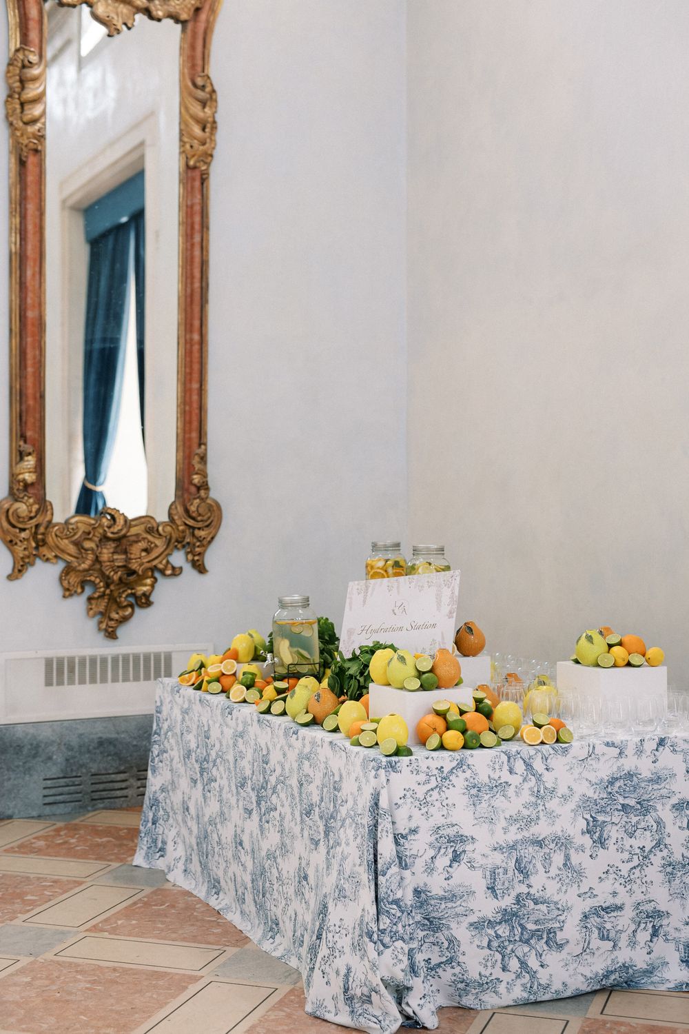 Luxury hydration station with fresh lemons and limes at destination wedding in Portugal