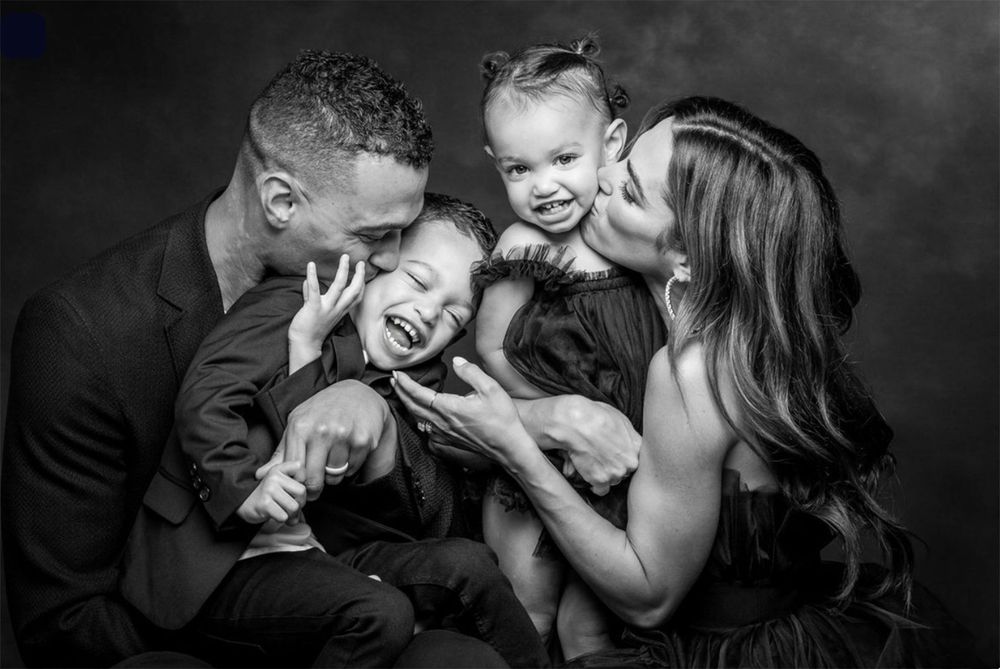 A series of black and white photos showing people laughing and sharing joyful moments together.