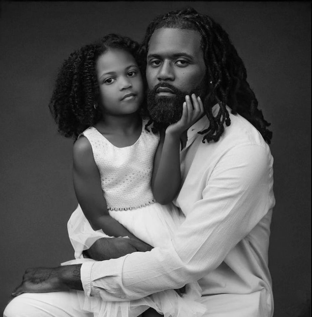 A black and white photo series showing intimate embraces and tender moments between two people in white clothing.