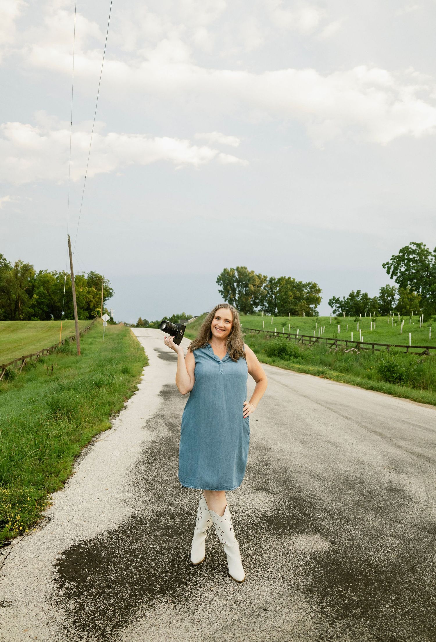 Marion senior photographer and Marion family photographer Nichole on a country road.