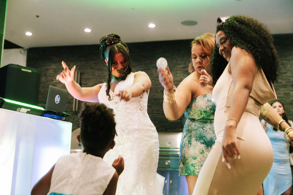 A collage of people dancing and celebrating at what appears to be a wedding reception with green lighting effects.