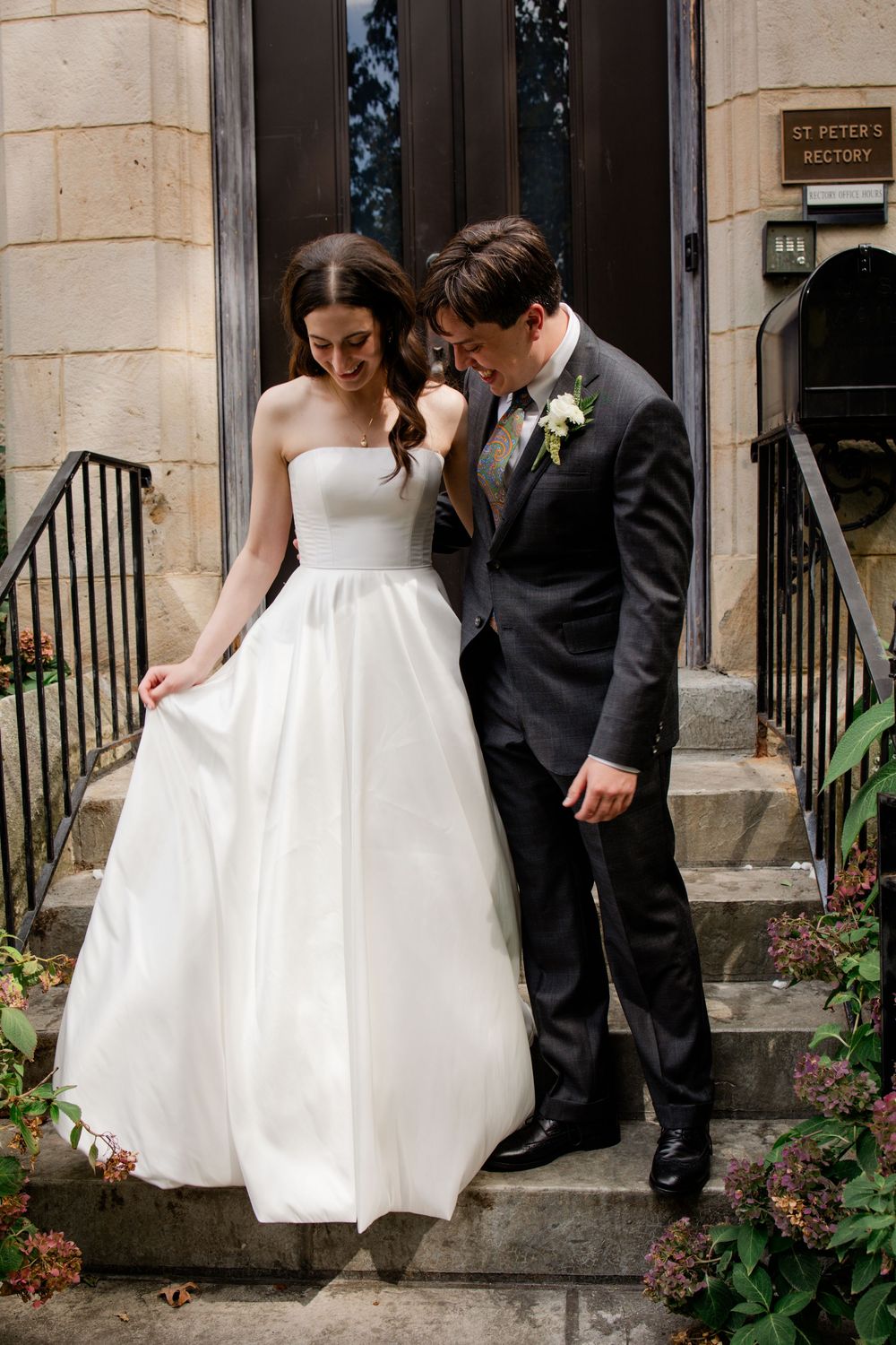 A sequence of wedding photos showing a couple descending stone steps in formal attire.