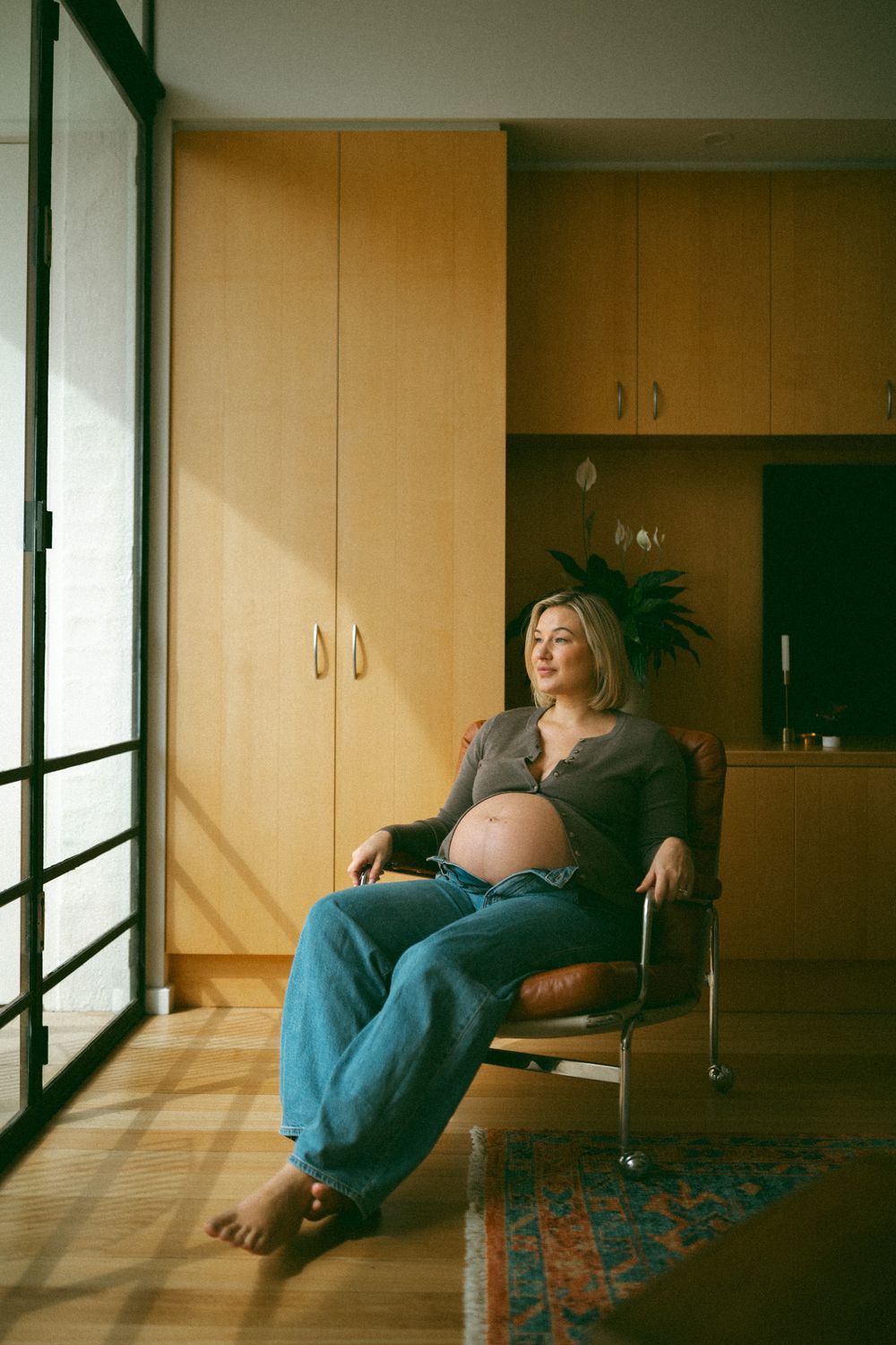 A sequence of photos showing a person lounging in a sunlit room with wooden cabinets and large windows.