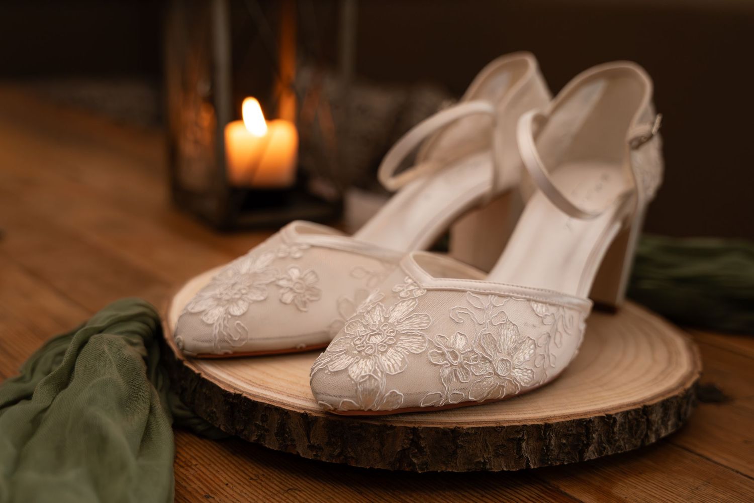A row of elegant white ballet flats during a wedding in Lincolnshire.
