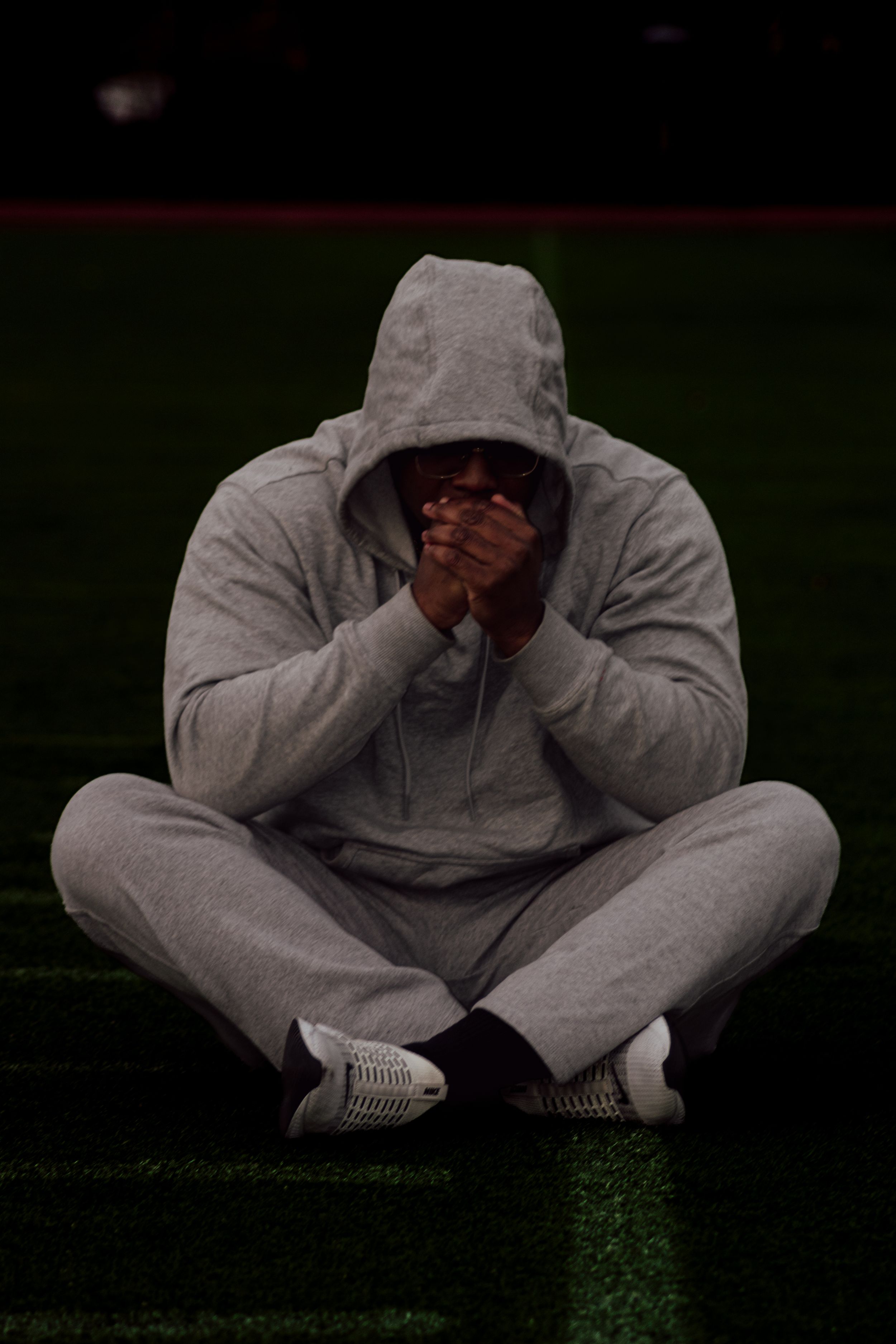 Man wearing casual/workout attire for lifestyle photoshoot - outdoor park