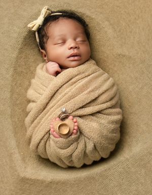A series of peaceful newborn photos showing a baby wrapped in beige blanket against neutral background.