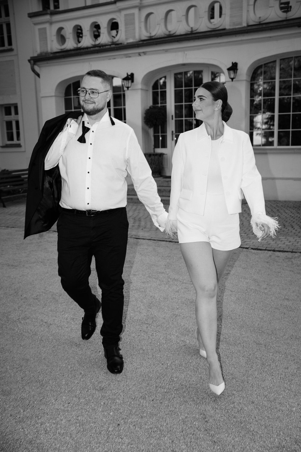 A black and white photo sequence shows two people in formal attire walking together on a grassy area.