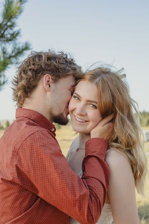 Joey and Trinity share a heartfelt moment, glowing with love and connection in a beautifully captured couples portrait session.