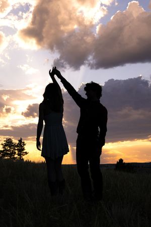 Joey and Trinity share a heartfelt moment, glowing with love and connection in a beautifully captured couples portrait session.
