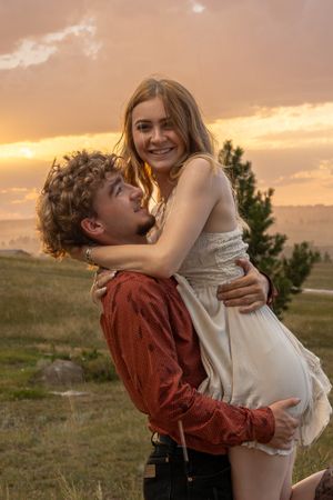 Joey and Trinity share a heartfelt moment, glowing with love and connection in a beautifully captured couples portrait session.