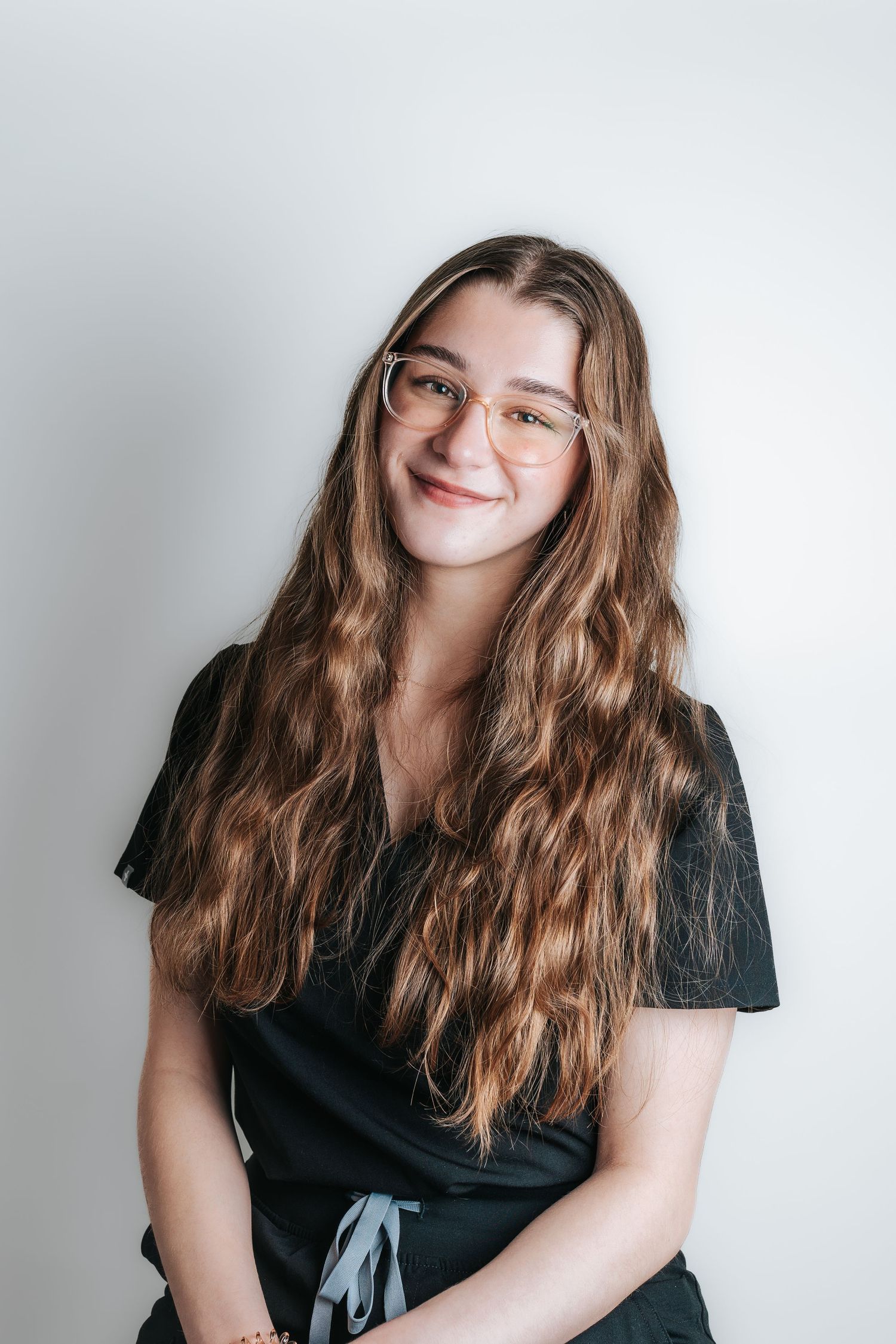 Portrait series against white backdrop showing expressive poses.