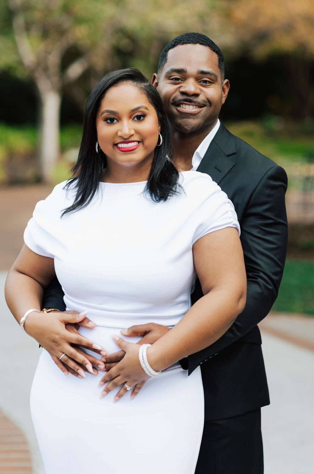 Lovebirds posing amidst colorful blooms at the Dallas Arboretum