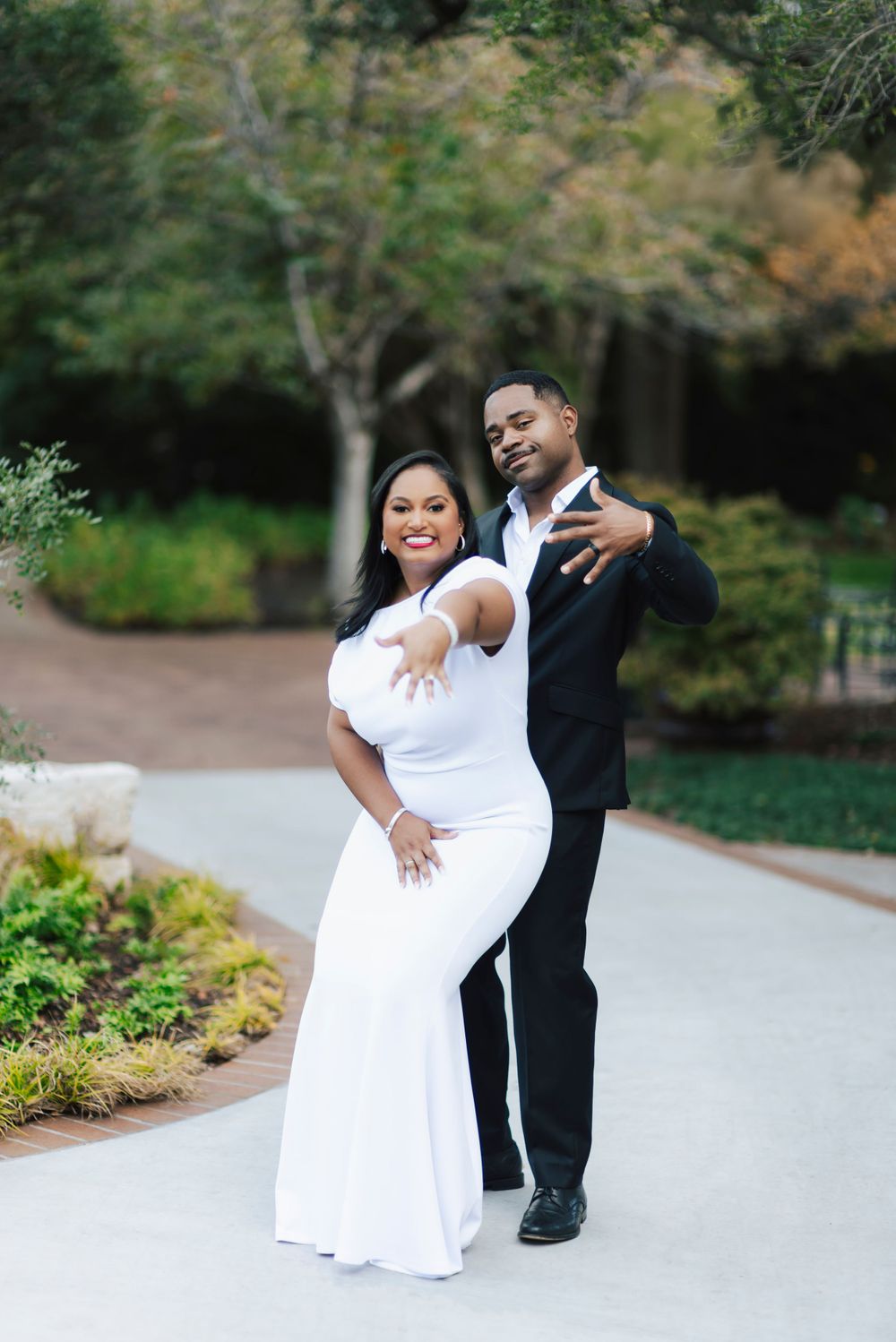 Timeless engagement photo in the Crape Myrtle Allee.