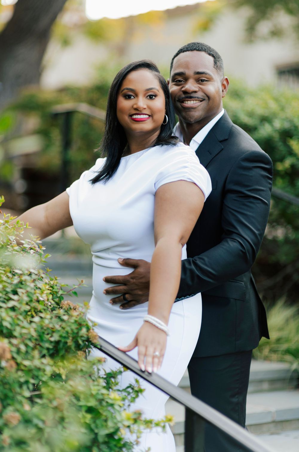 Engagement session in Dallas with serene water feature reflections