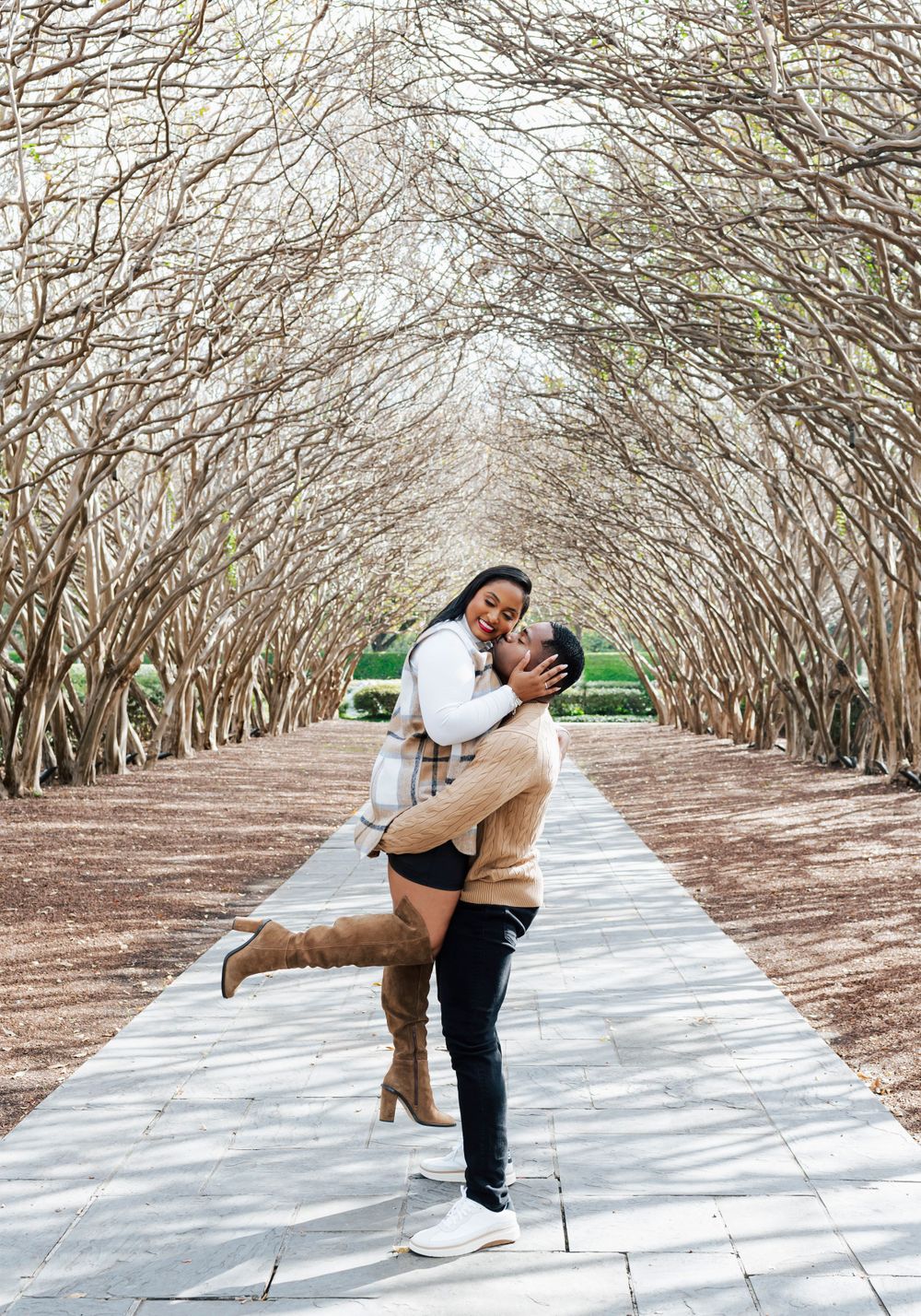 Close-up of couple holding hands during an engagement shoot