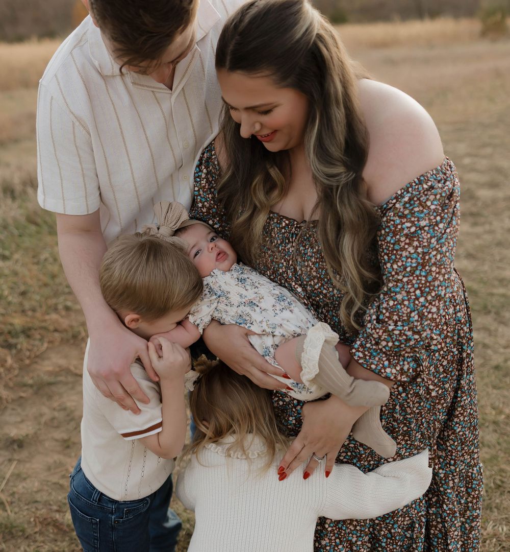 Tender family moment captured in a series of intimate outdoor portraits at golden hour.