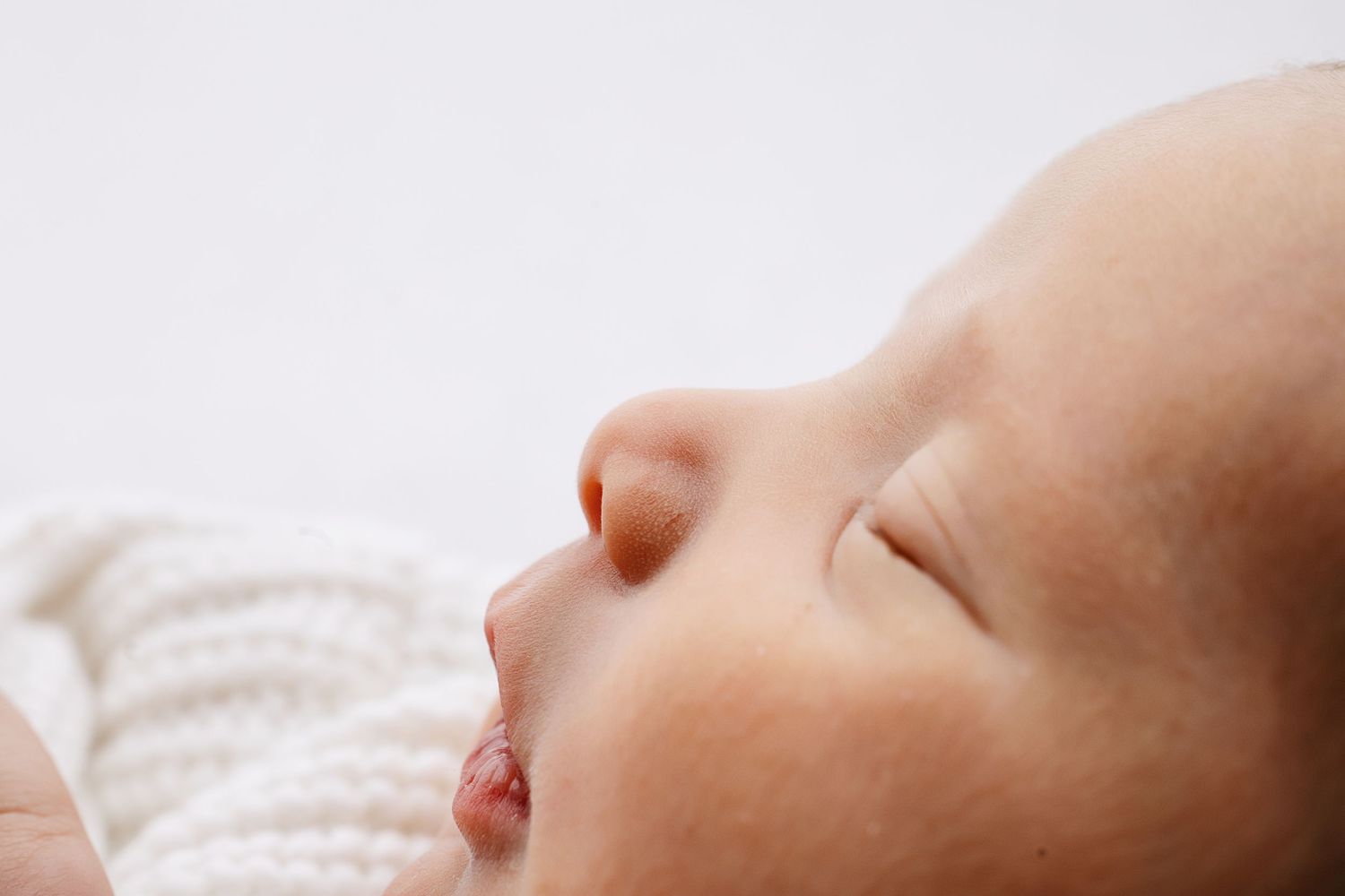 Macro newborn photo of tiny baby profile captured during a Middle Tennessee newborn photography session