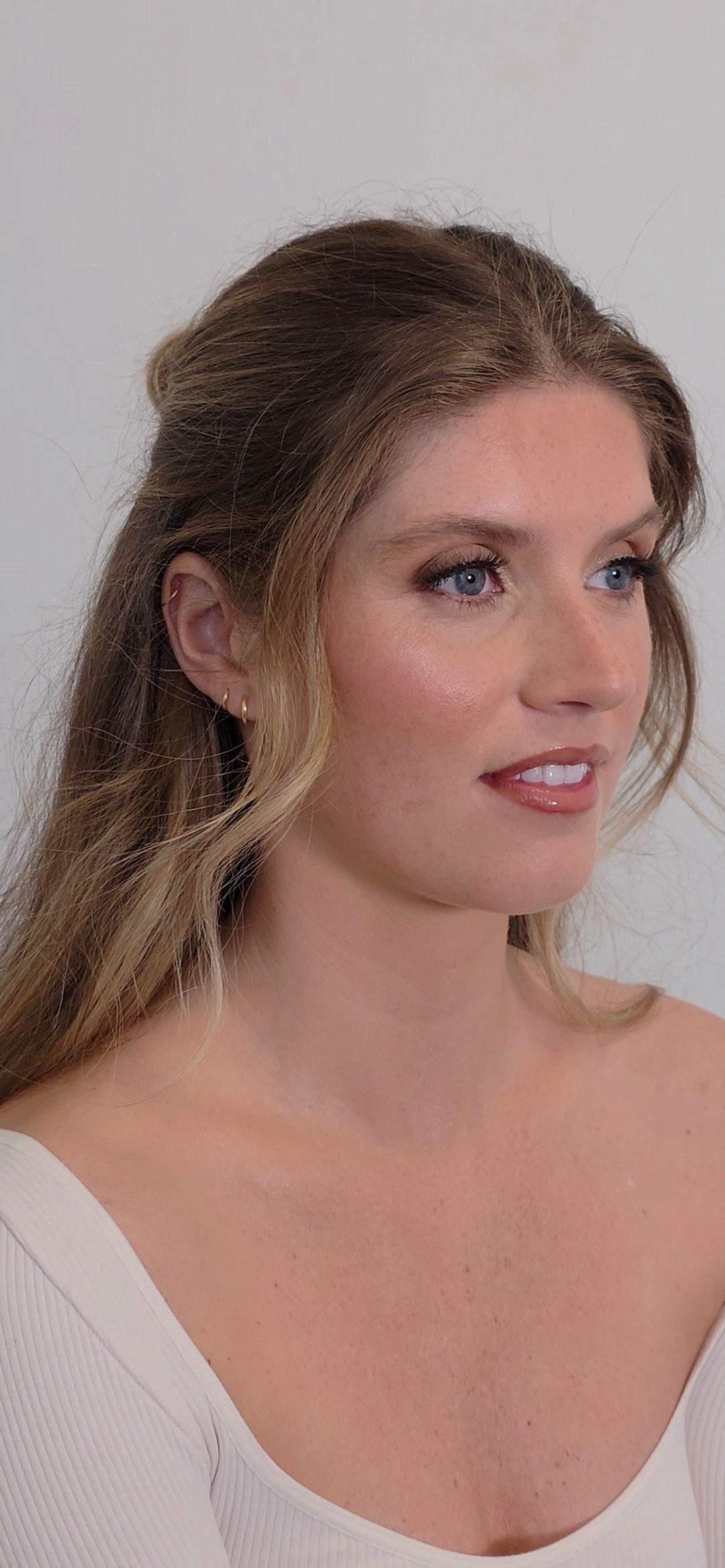 Glamour beauty shots showing silver-blonde hair with dark roots and dramatic makeup.