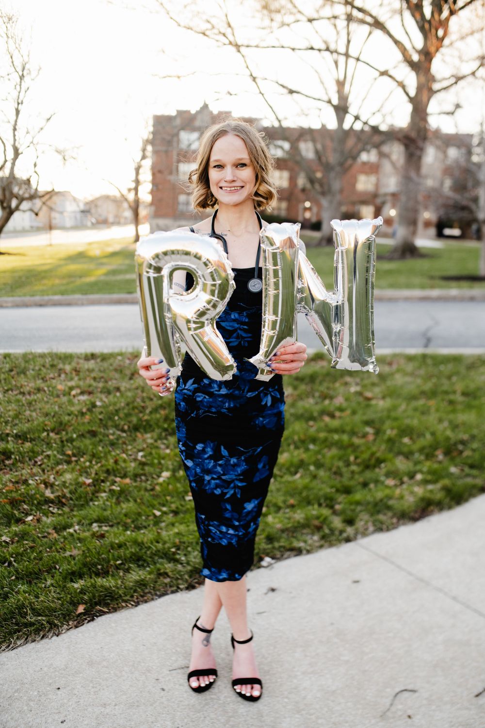 Graduation photo at Columbia College, capturing a timeless and sophisticated moment of achievement, graduating with a nursing degree.