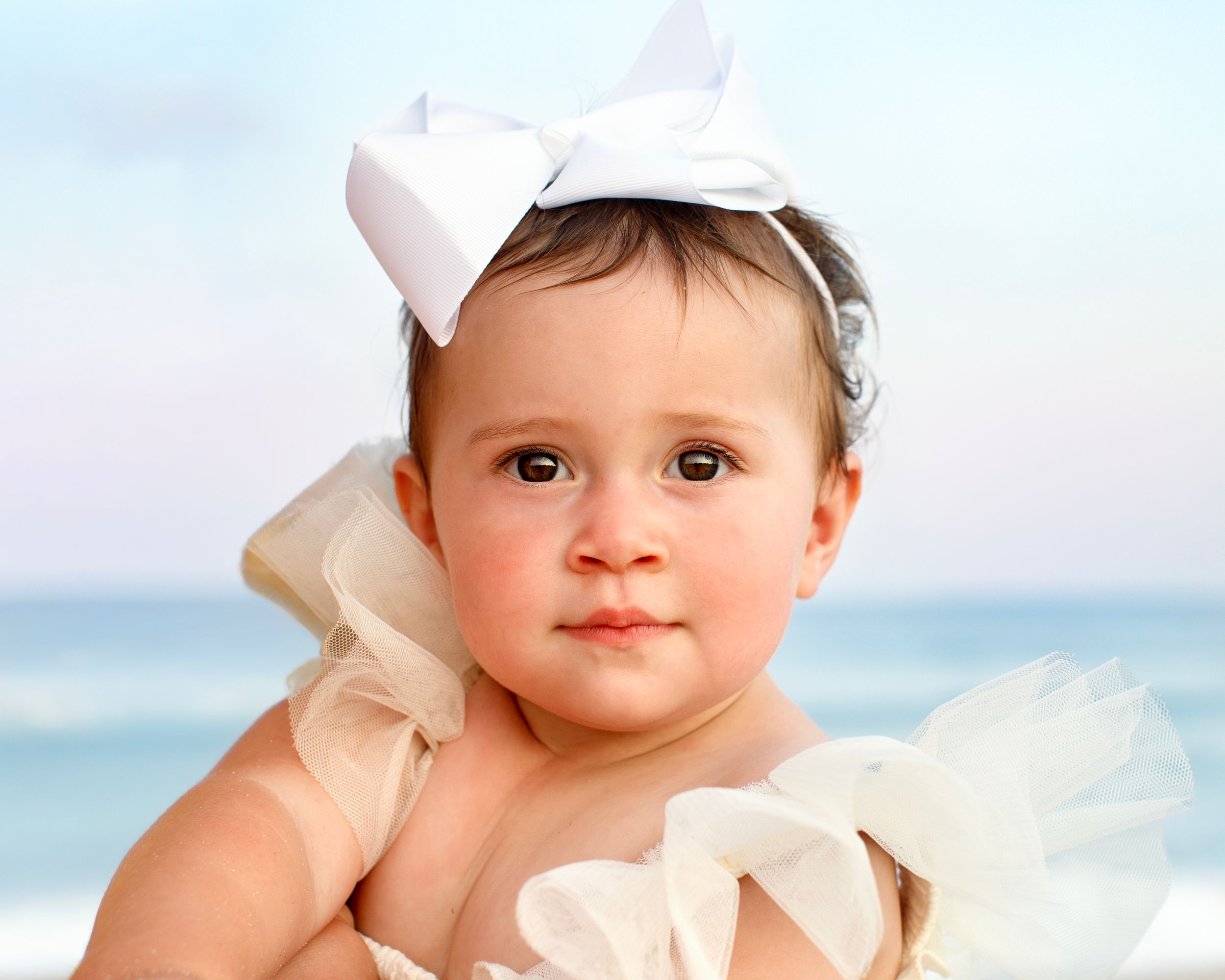 Bergen-County-Family-Photographer and LBI Family Photographer captures baby girl in front of beautiful sunset
