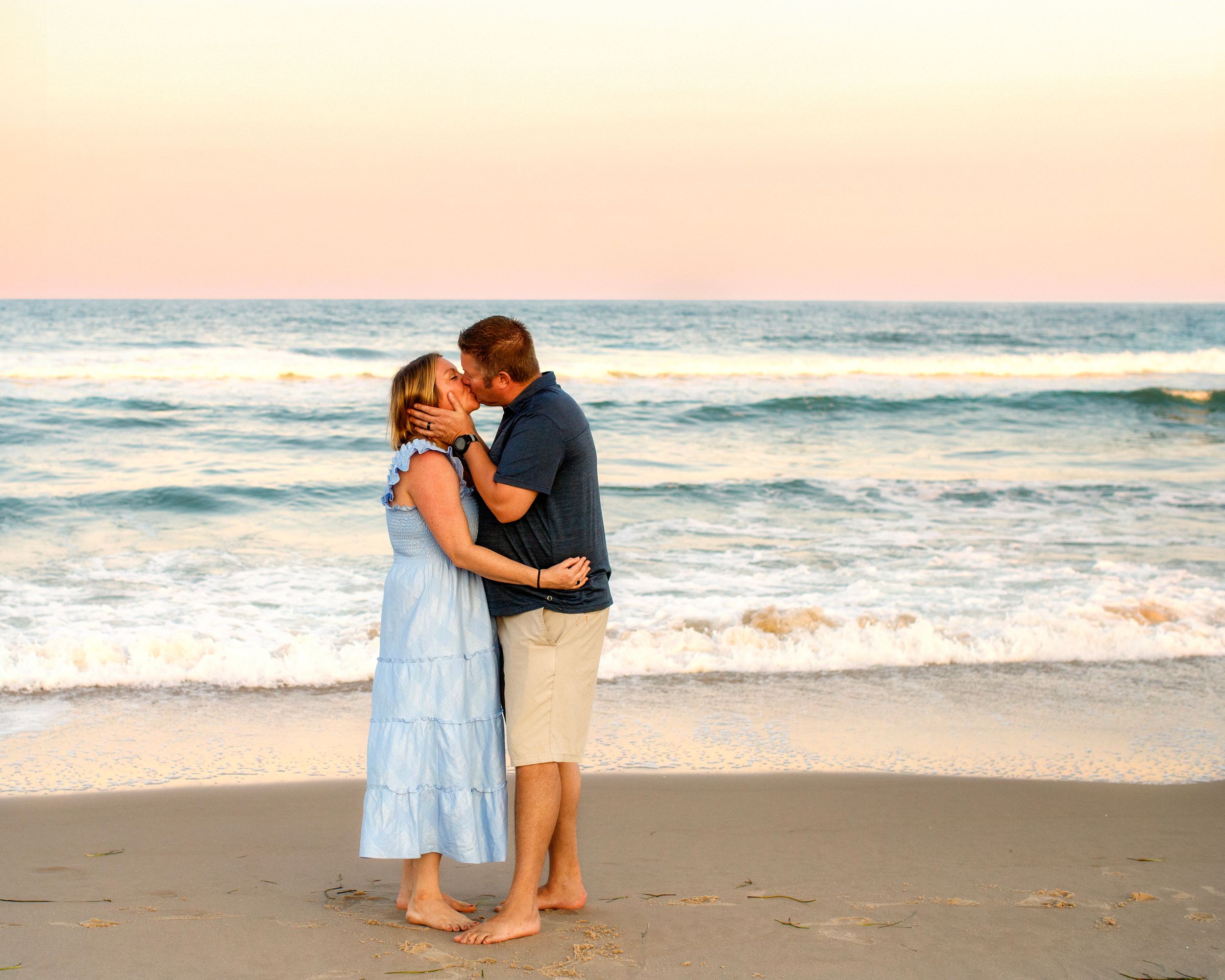 engagement photoshoot on the beach LBI, NJ couple kissing