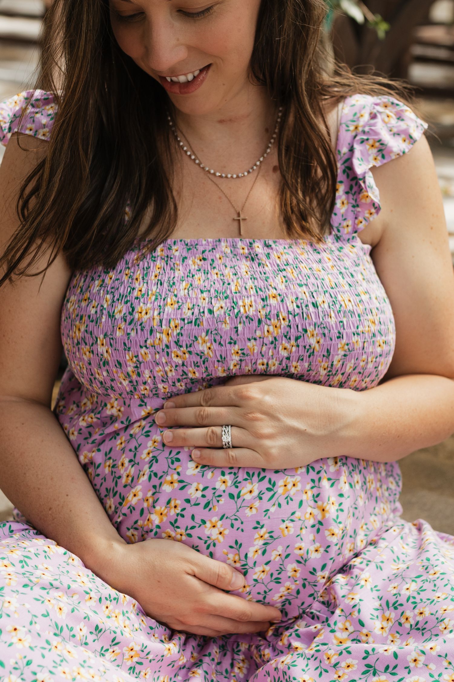 Close-up shots highlighting a floral dress and jewelry details in warm natural lighting.