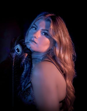Cinematic portrait of a woman photographed in NSW by Wollongong portrait photographer Serene Coleman.