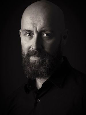Cinematic portrait of a man photographed in NSW by Wollongong portrait photographer Serene Coleman.