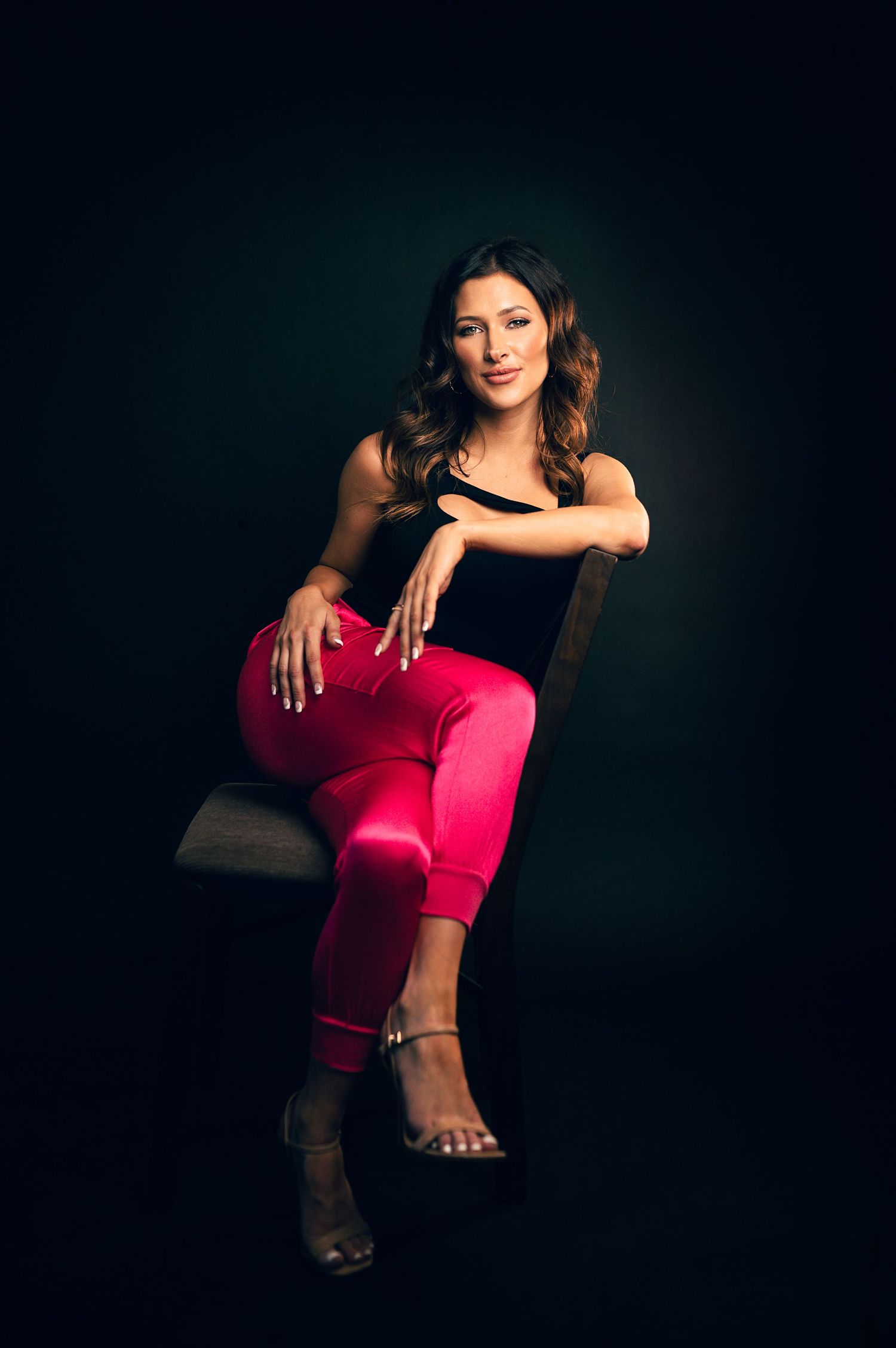 Dark Background moody headshot and branding poses for female in Salt lake city and Ogden Utah headshot photographer Carl James