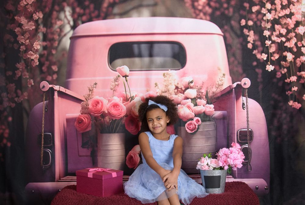 Pink cherry blossoms frame a vintage pickup truck with a dreamy, romantic atmosphere in multiple compositions.