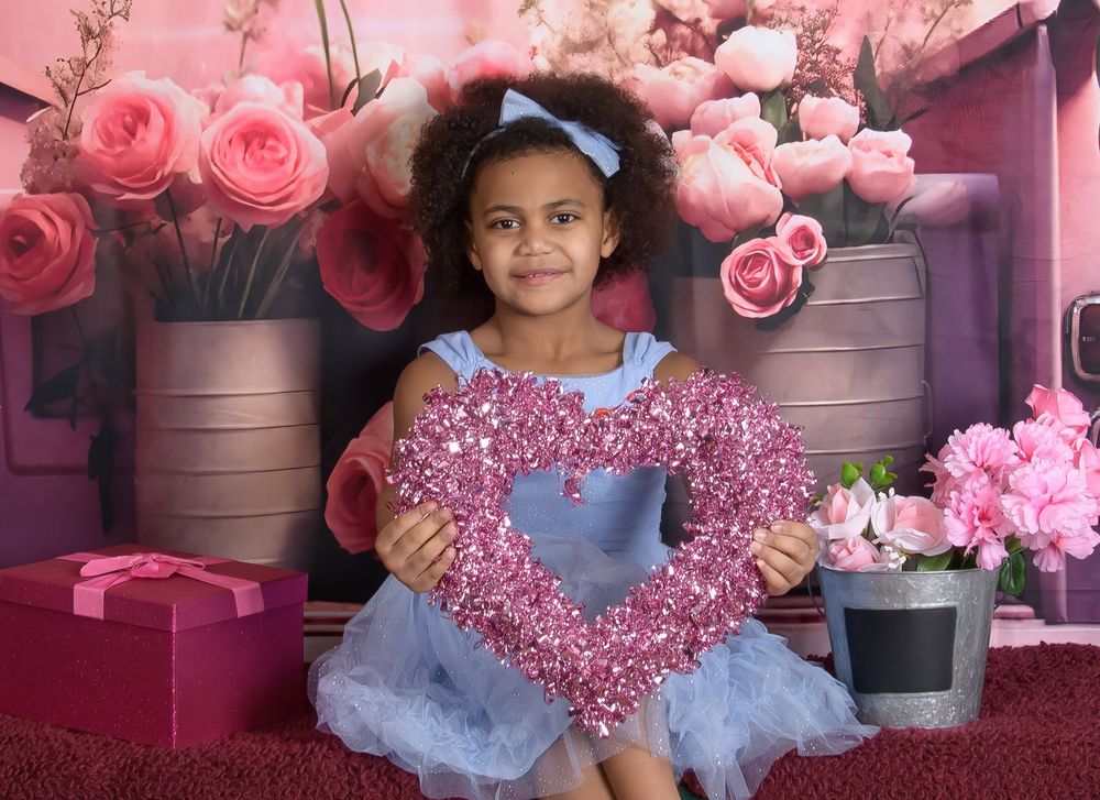 A pink and purple themed photo collage with tulle dresses and floral decorations in a dreamy setting.